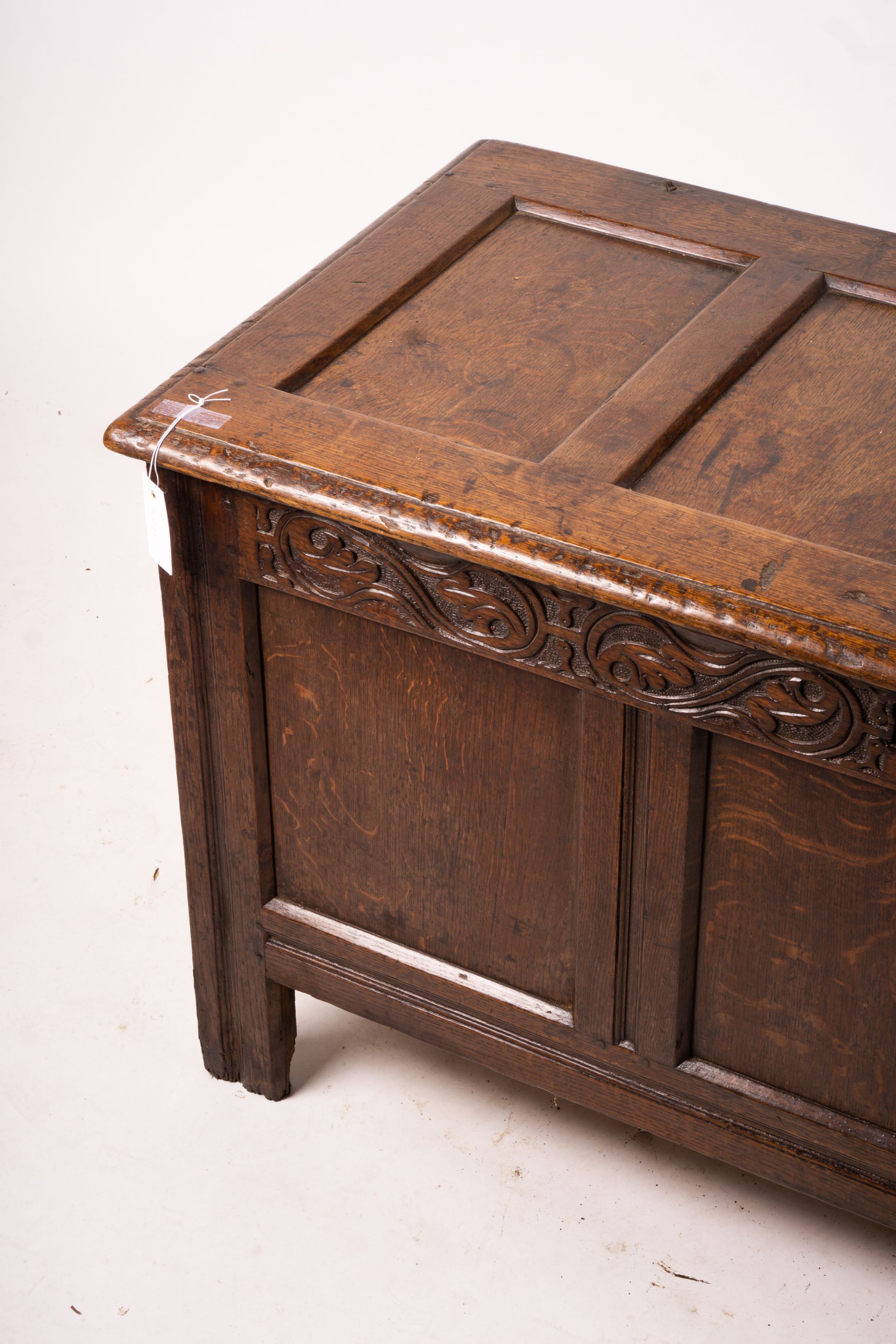 A 17th century panelled oak coffer, W.122cm D.55cm H.65cm